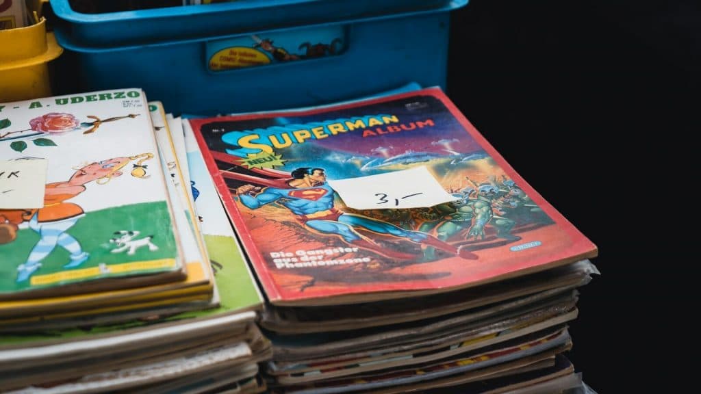 a stack of children's books sitting on top of a table
